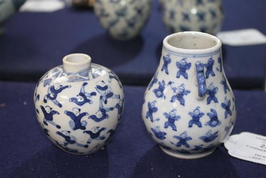 Two Chinese blue and white hundred boys vases, larger 8cm.